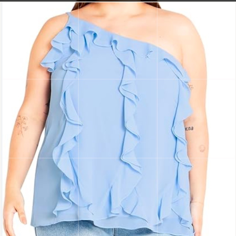 Baby blue ruffled one sleeved blouse.